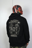 Former IWGP Jr Heavyweight Champion Bushi in The Official New Japan Pro Wrestling 2017 Los Ingobernables de Japon (LIJ) day of the dead hoodie.