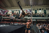 Jay White dives outside the ring