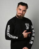 Former IWGP Jr Heavyweight Champion The Villain Marty Scurll in New Japan Pro Wrestling's Long Sleeve Skull and Bones Bullet Club T-shirt NJPW